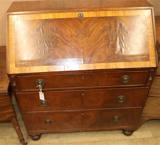 A late George III satinwood banded mahogany bureau W.90cm